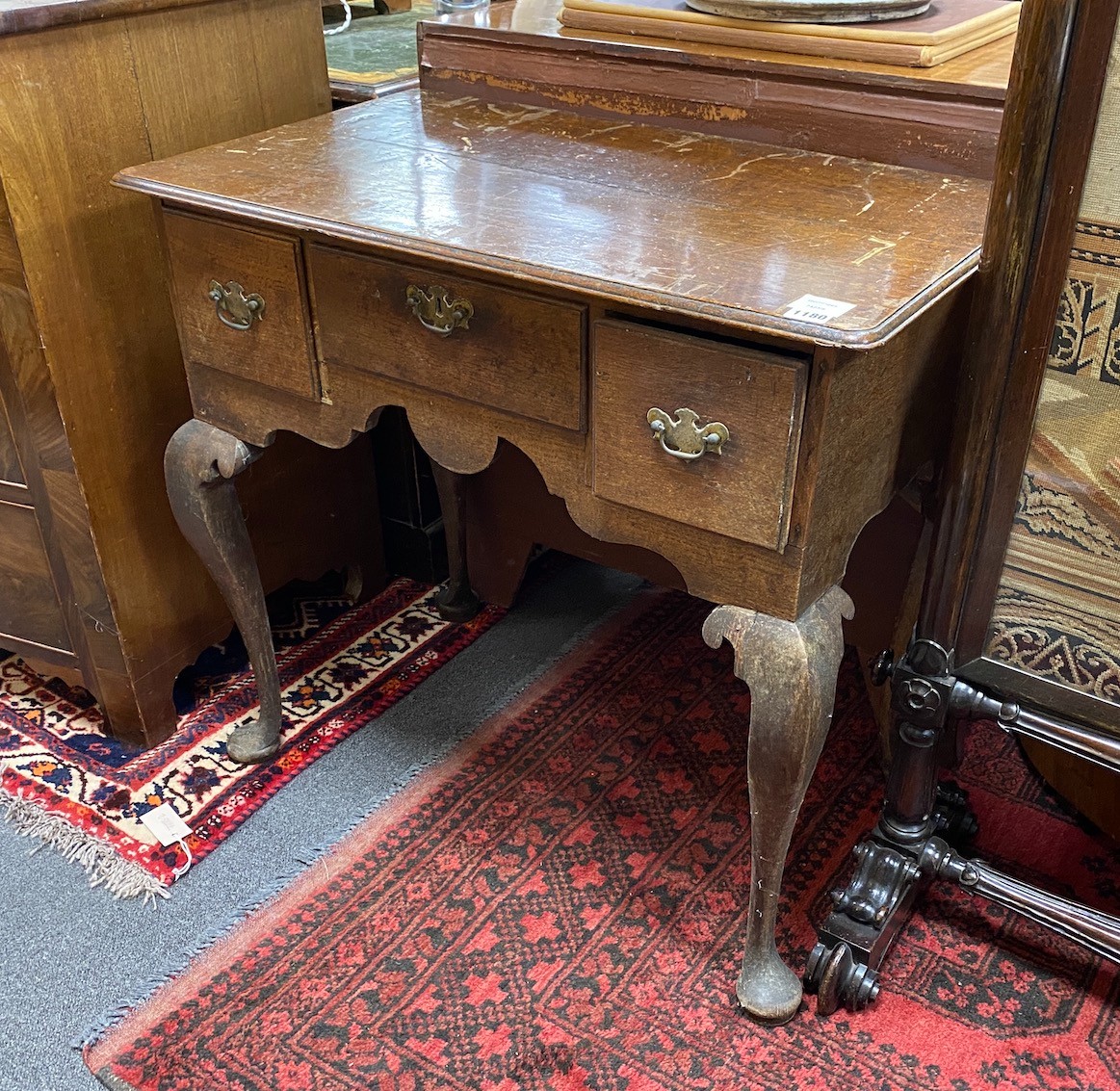An 18th century oak lowboy, width 78cm, depth 46cm, height 74cm